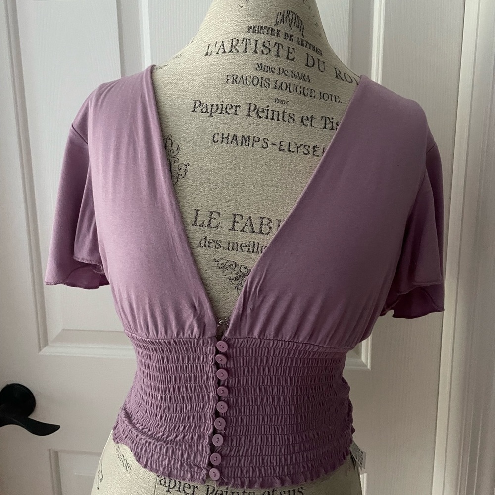 Women’s purple blouse with deep V